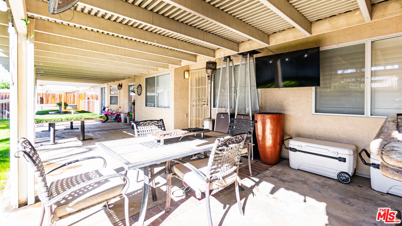 69817 Brookview Way Cathedral City, CA 92234 - Photo 26 of 38 a view of a livingroom with furniture and window