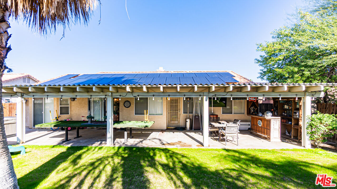 69817 Brookview Way Cathedral City, CA 92234 - Photo 30 of 38 a view of a house with swimming pool and porch