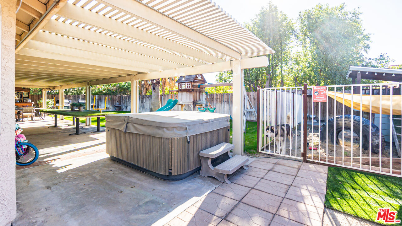 69817 Brookview Way Cathedral City, CA 92234 - Photo 33 of 38 a view of a patio with table and chairs
