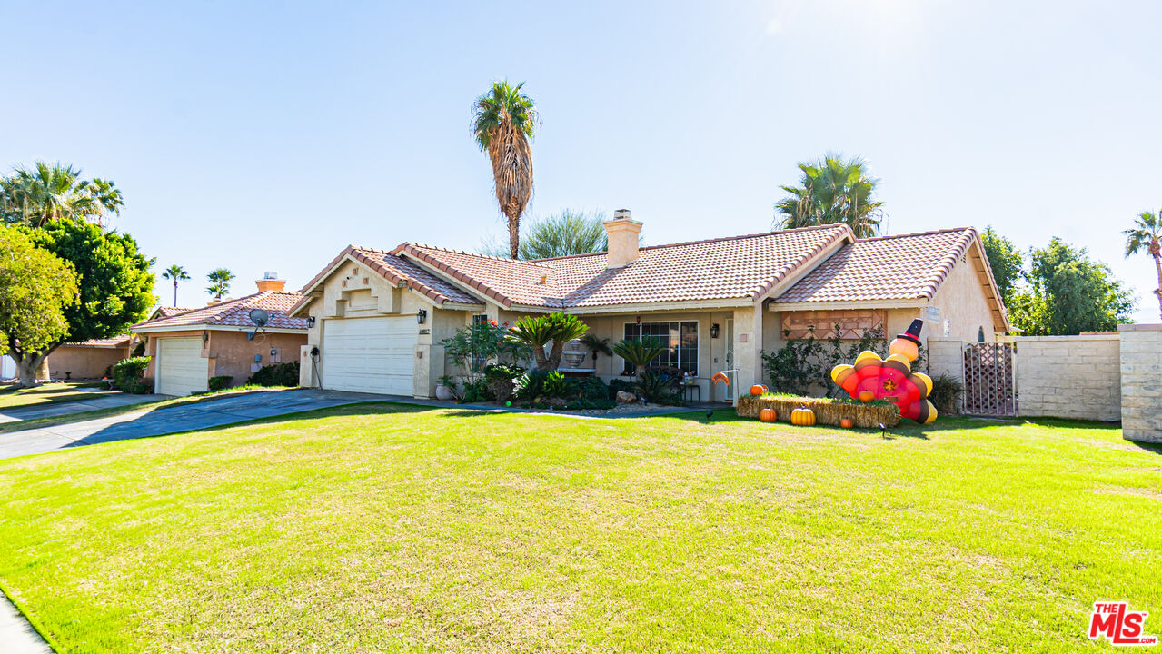 69817 Brookview Way Cathedral City, CA 92234 - Photo 38 of 38 a view of a house with swimming pool and sitting area