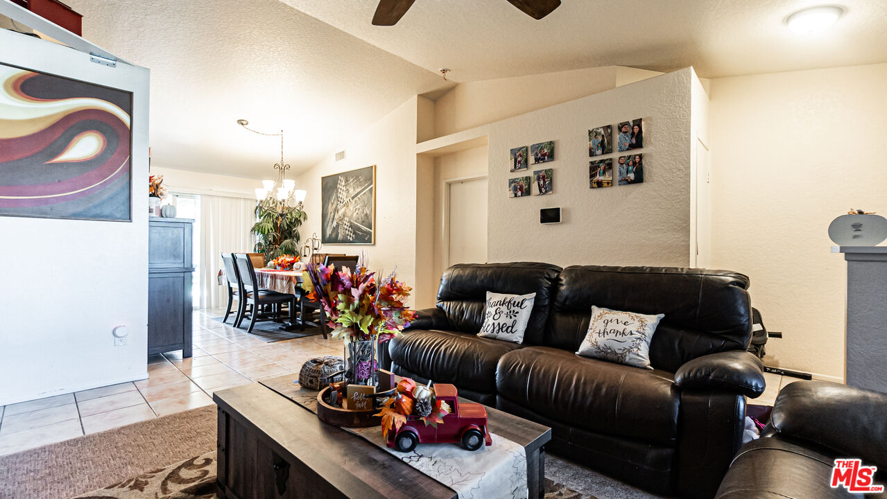 69817 Brookview Way Cathedral City, CA 92234 - Photo 4 of 38 a living room with furniture and a couch