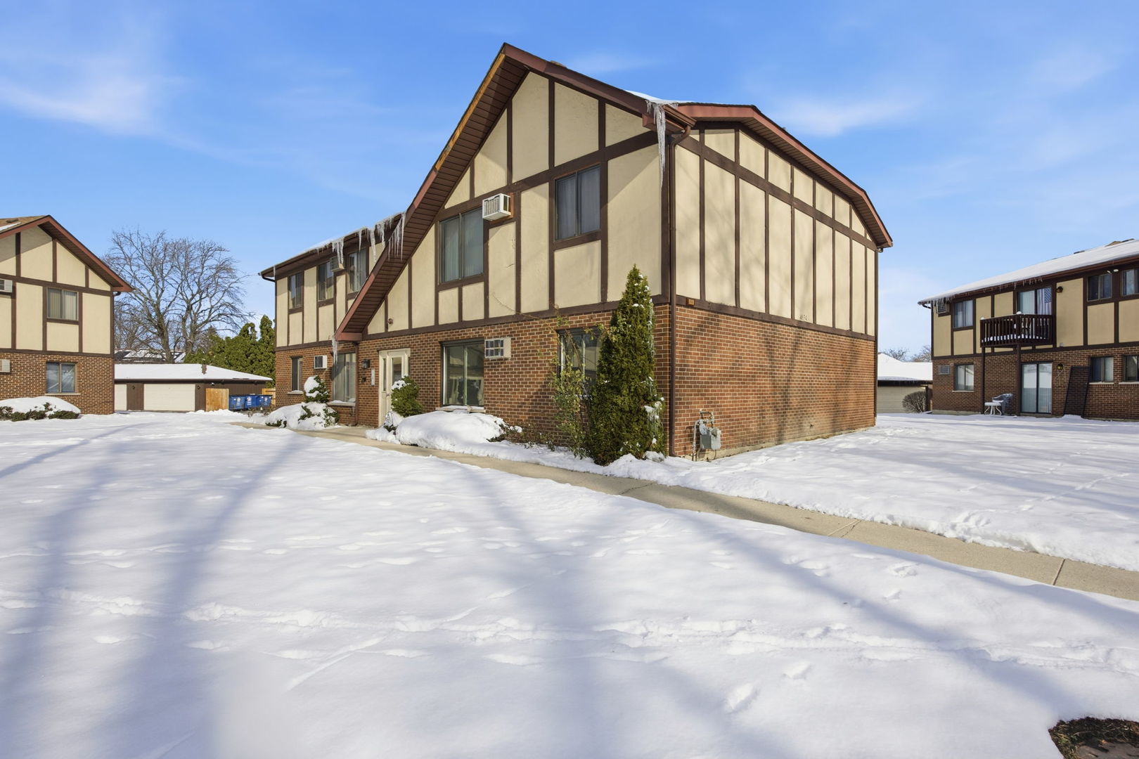a view of a house with a street