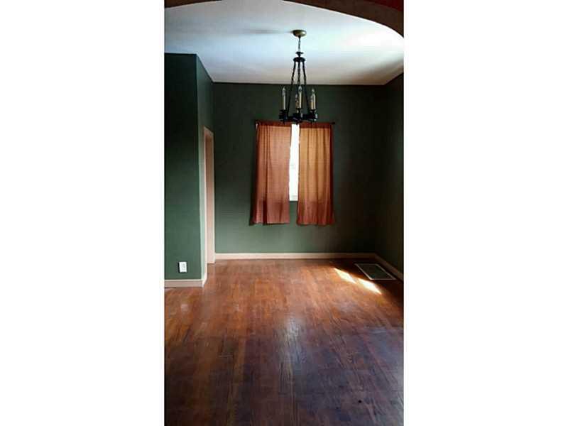 146 Riverview Street McKees Rocks, PA 15136 - Photo 6 of 7 Dining Room. Large Dining room with Unique Light fixture. Additional shelving space in corner