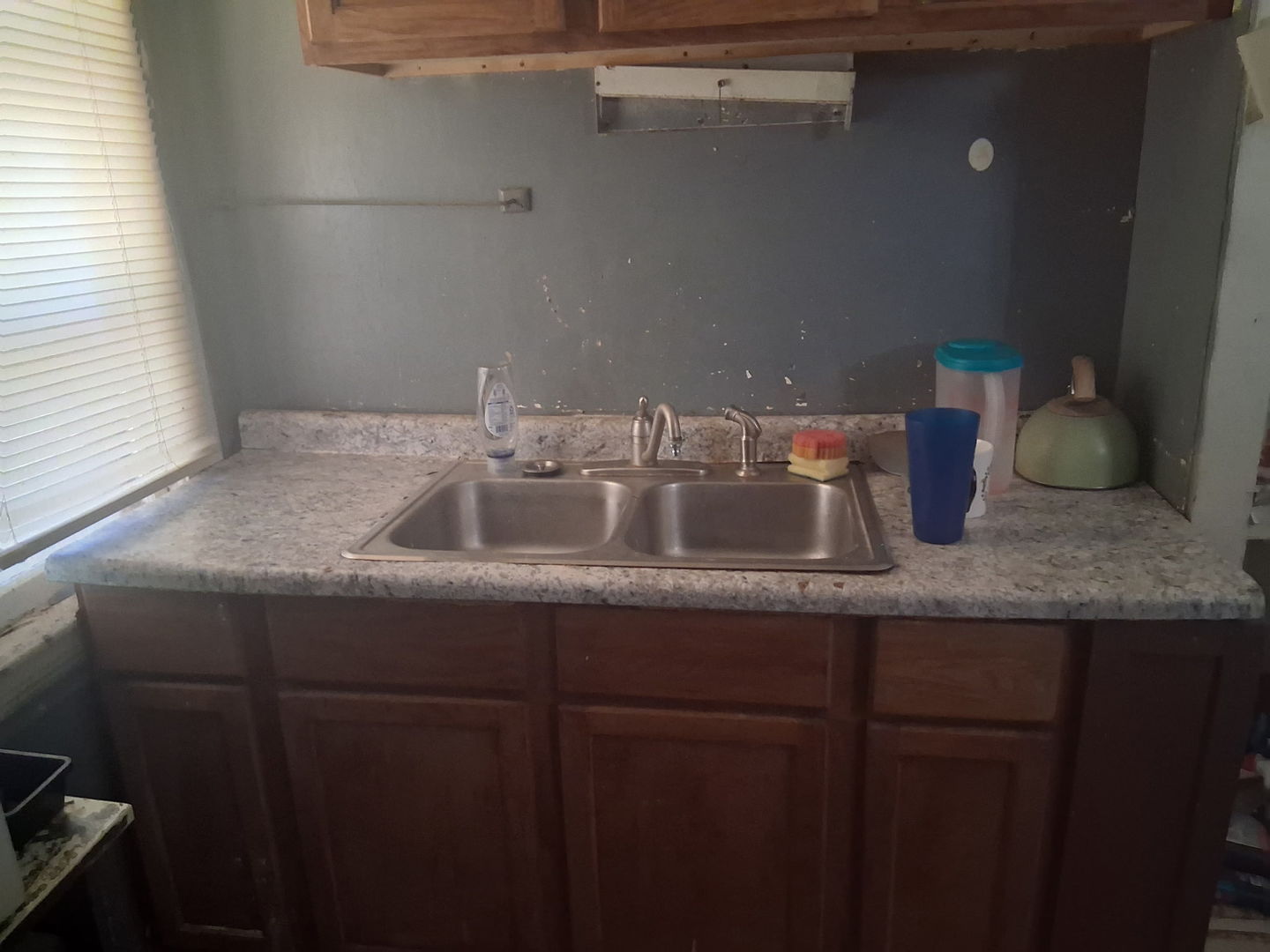 441 South Seigel Street Decatur, IL 62522 - Photo 5 of 7 a bathroom with a granite countertop sink and a mirror