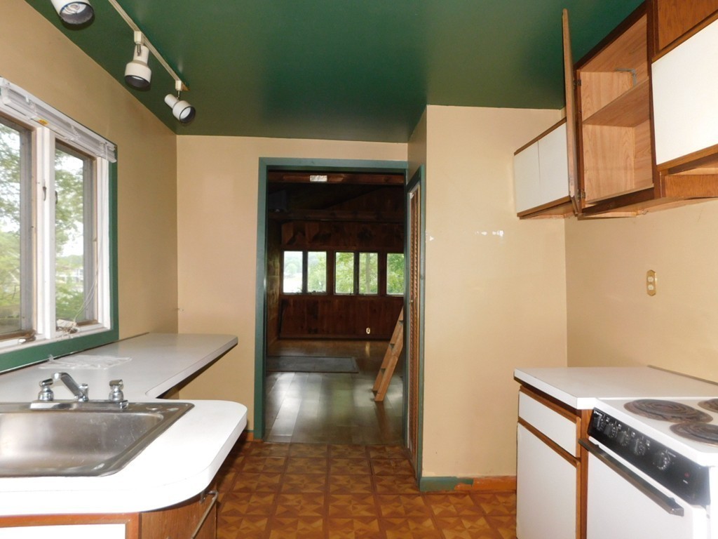 74 Union Road Wales, MA 01081 - Photo 5 of 14 a kitchen that has a sink and a stove