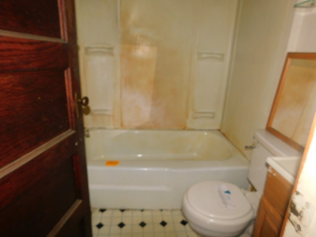 74 Union Road Wales, MA 01081 - Photo 9 of 14 a bathroom with a tub and toilet