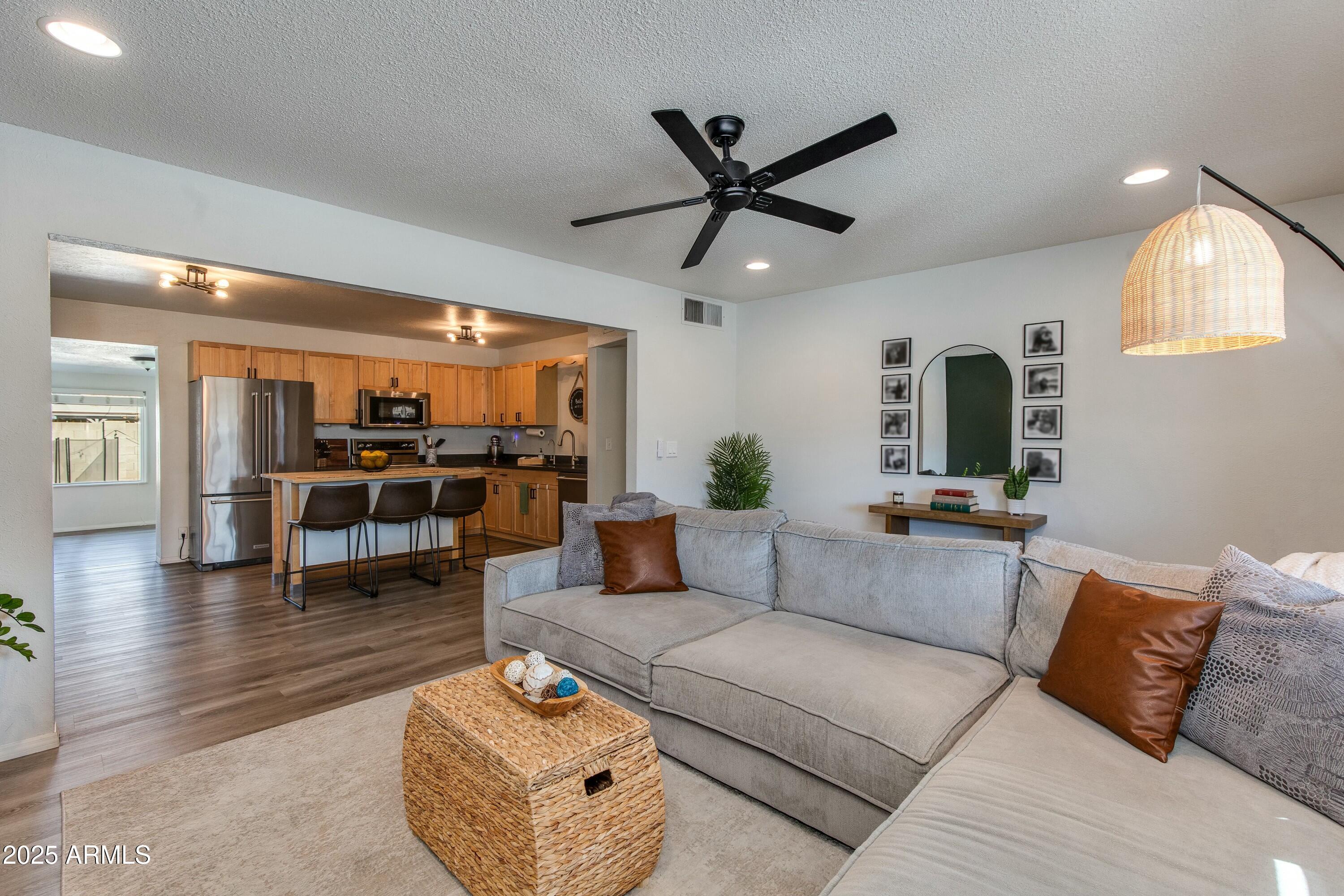 3350 West Charter Oak Road Phoenix, AZ 85029 - Photo 6 of 29 Living Room / Kitchen