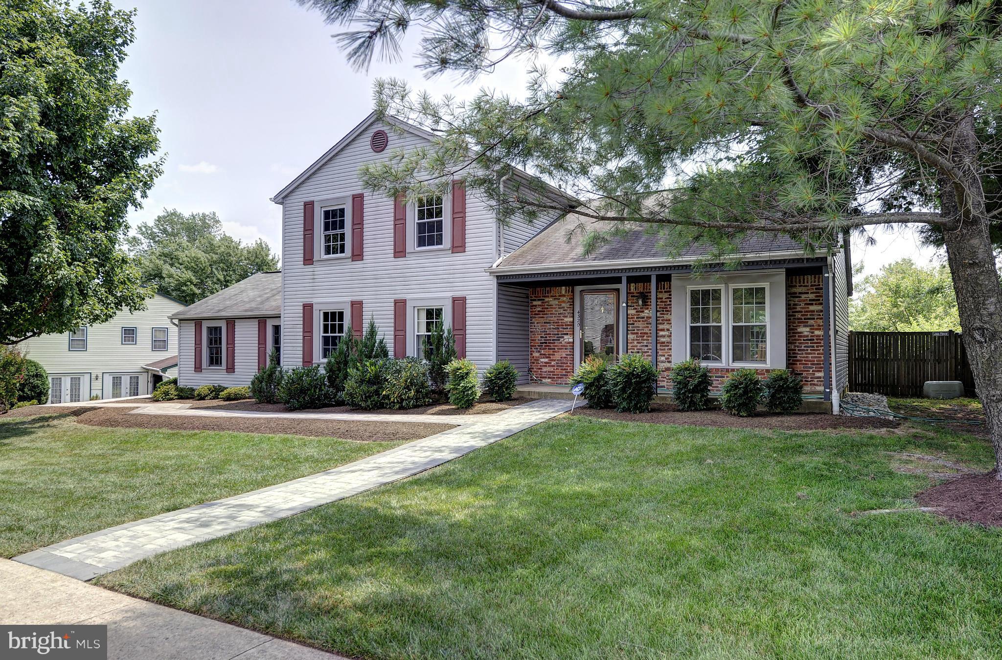 4320 Cub Run Road Chantilly, VA 20151 - Photo 1 of 30 a front view of a house with a yard