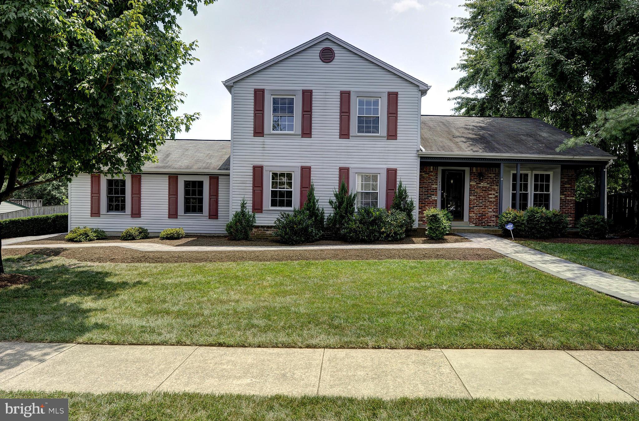 4320 Cub Run Road Chantilly, VA 20151 - Photo 2 of 30 a front view of a house with a yard
