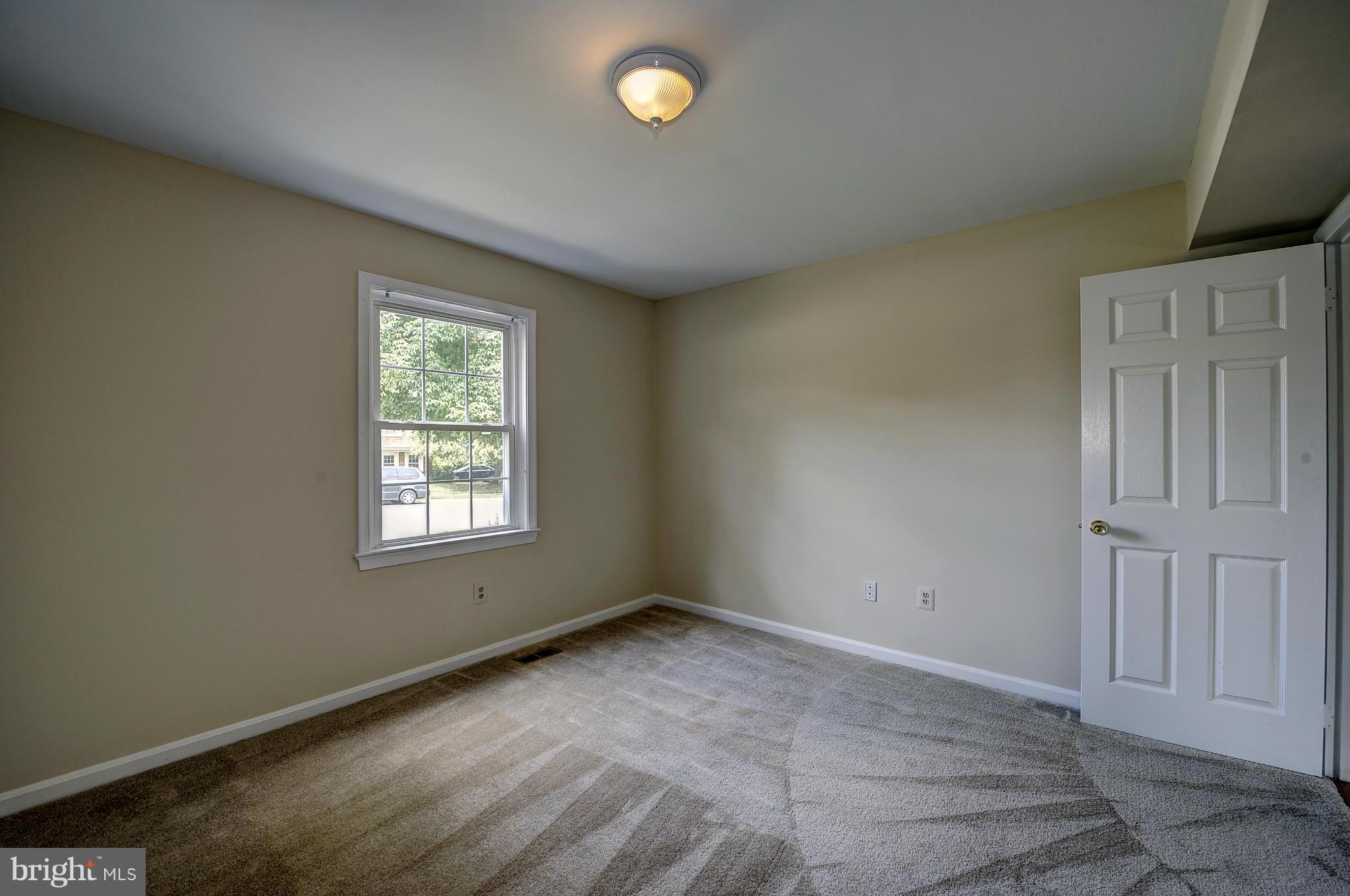 4320 Cub Run Road Chantilly, VA 20151 - Photo 24 of 30 an empty room with windows and closet