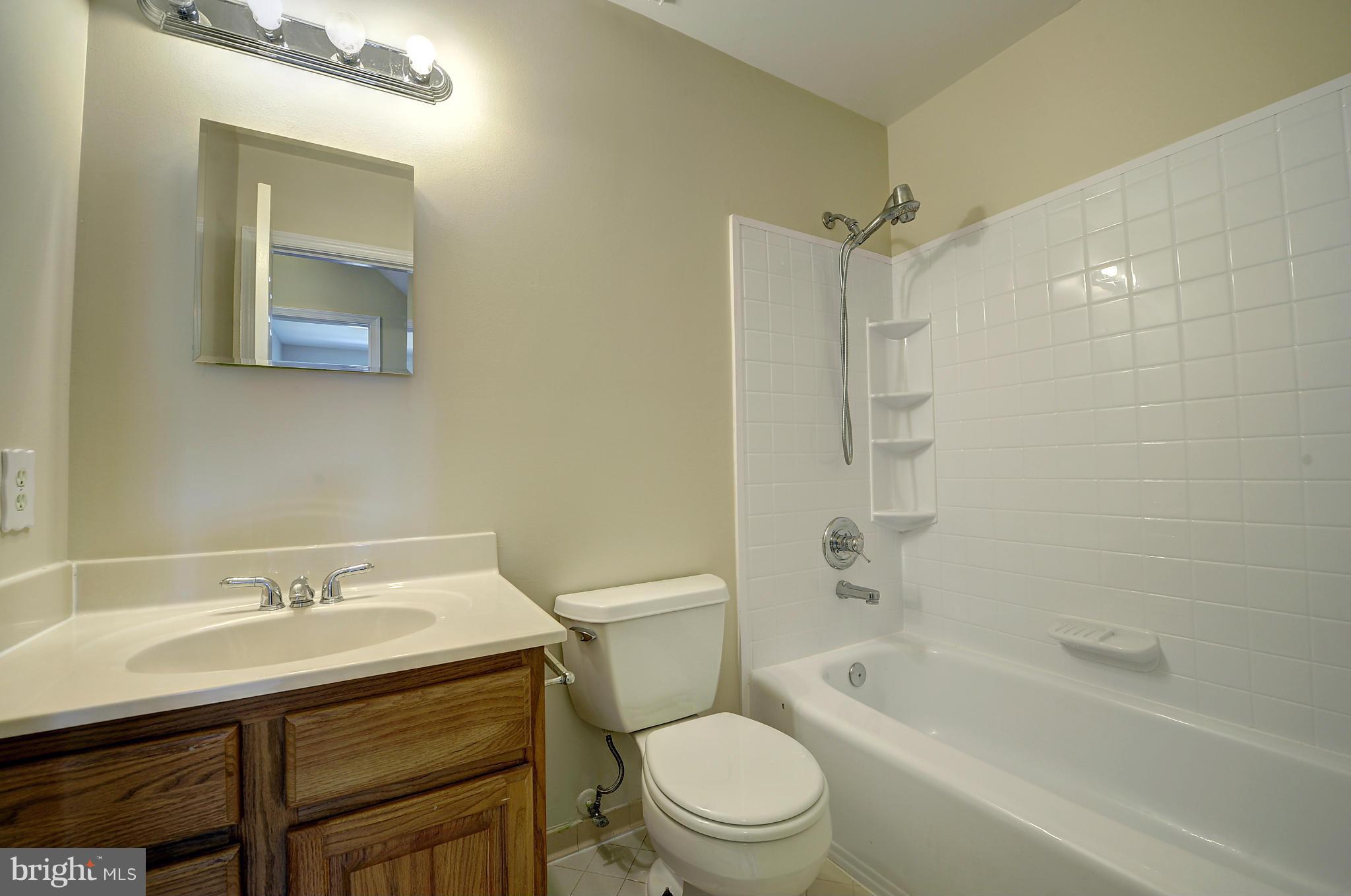 4320 Cub Run Road Chantilly, VA 20151 - Photo 25 of 30 a bathroom with a sink a toilet and shower