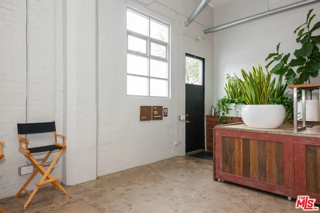 a view of swimming pool with outdoor seating