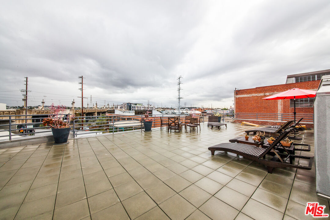 530 Molino Street, Unit 113 Los Angeles, CA 90013 - Photo 14 of 16 a view of swimming pool with outdoor seating