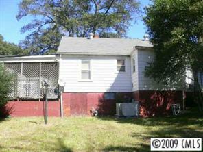 96 Robbins Street Southwest Concord, NC 28025 - Photo 2 of 3 a view of a back yard of the house