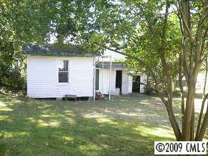 96 Robbins Street Southwest Concord, NC 28025 - Photo 3 of 3 a view of a house with a yard