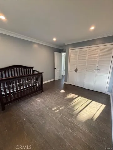 a view of an empty room with windows