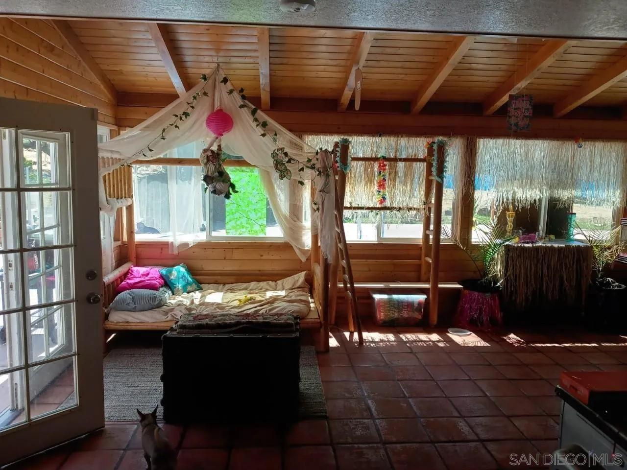 14380 Rios Canyon Road El Cajon, CA 92021 - Photo 11 of 14 a bedroom with furniture and a window