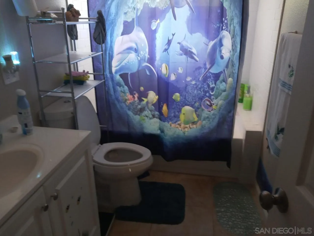 14380 Rios Canyon Road El Cajon, CA 92021 - Photo 7 of 14 a bathroom with a toilet and a sink