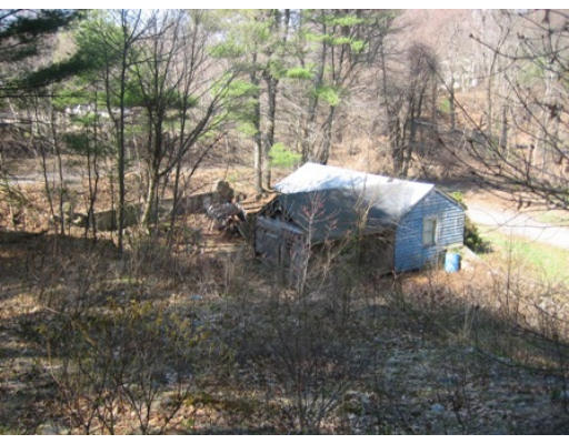 3 Blair Road Ipswich, MA 01938 - Photo 1 of 4 a view of a wooden house with a yard