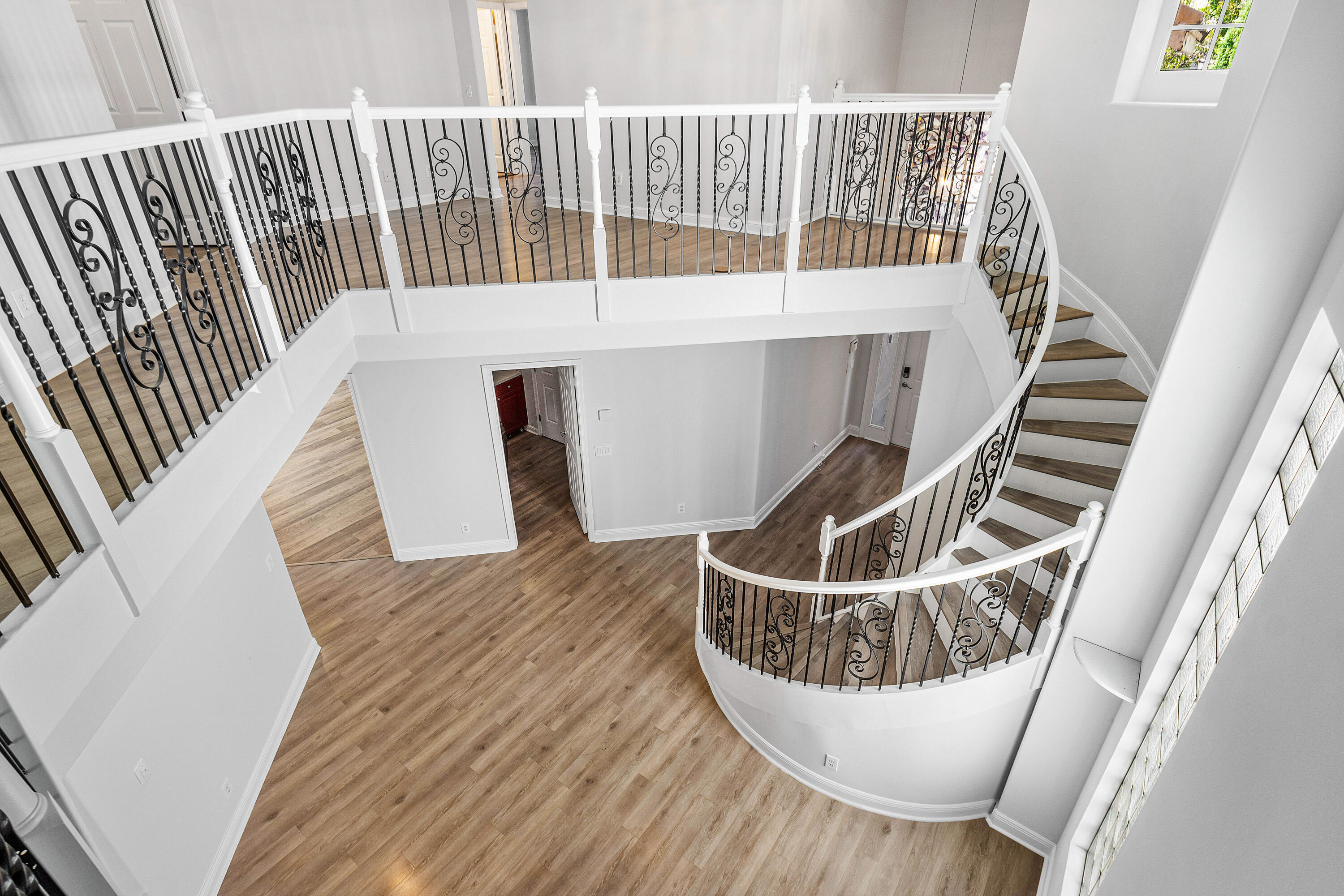 1655 East Classical Boulevard Delray Beach, FL 33445 - Photo 14 of 40 a view of balcony with wooden floor