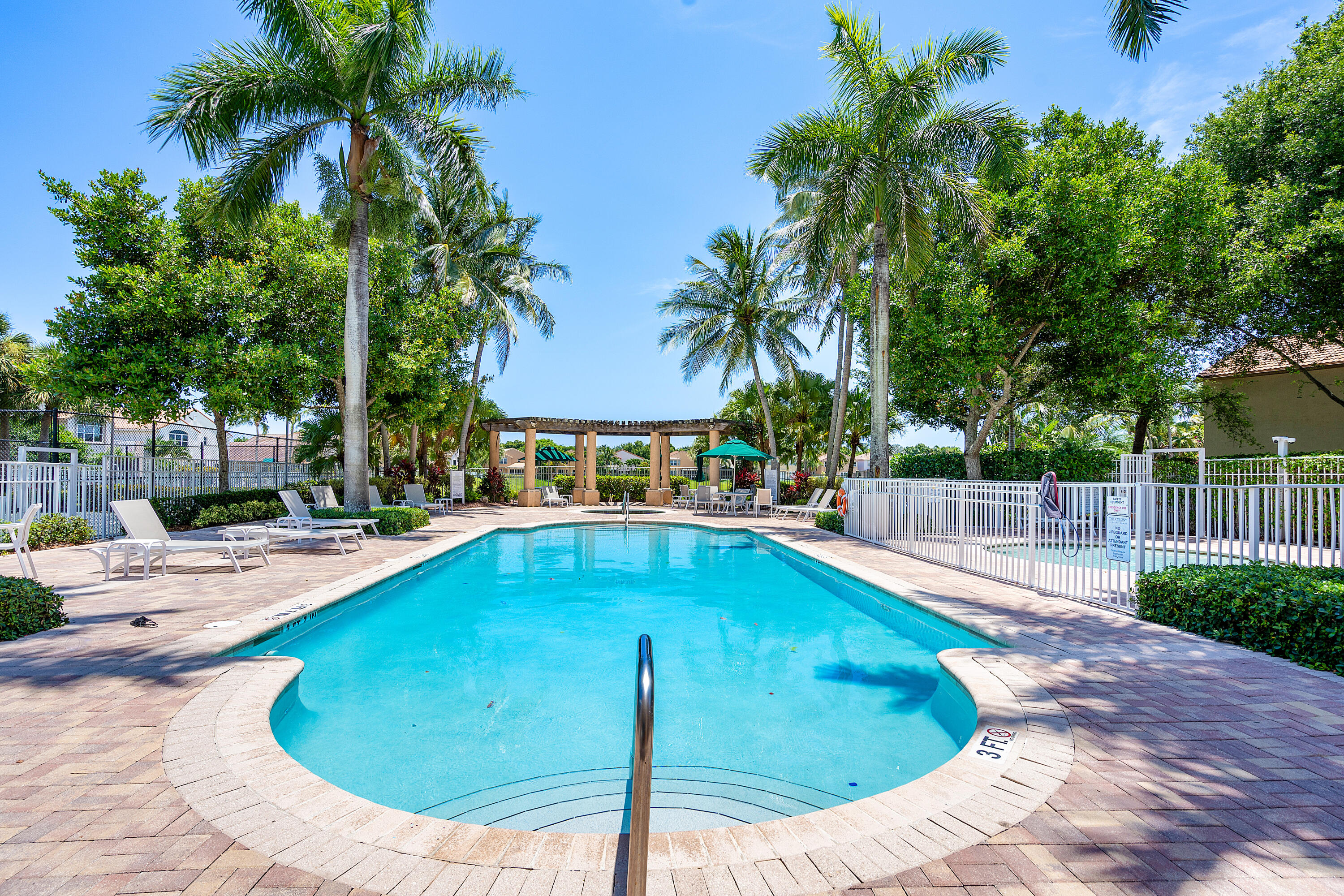 1655 East Classical Boulevard Delray Beach, FL 33445 - Photo 38 of 40 a swimming pool with outdoor seating and yard