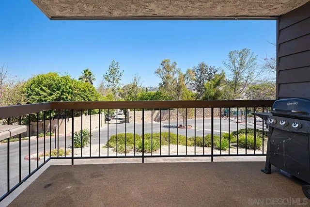 a view of a street from a balcony