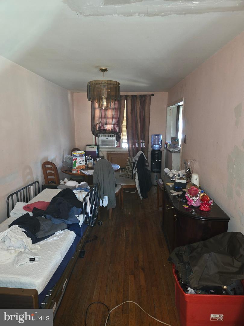 6340 Calvert Street Philadelphia, PA 19149 - Photo 3 of 14 a living room with furniture and a chandelier