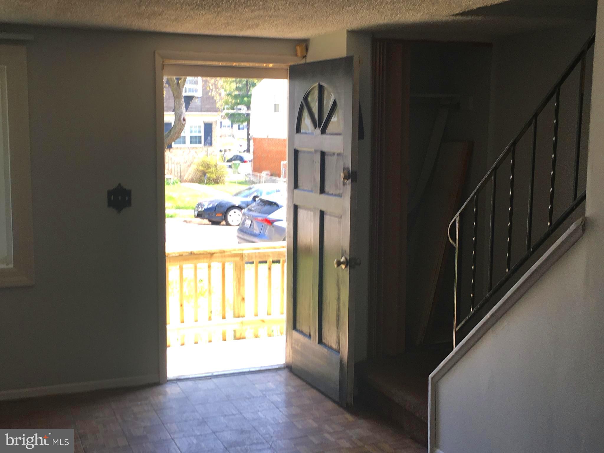 5212 Saybrook Road Baltimore, MD 21206 - Photo 8 of 23 Living Room and Front Door