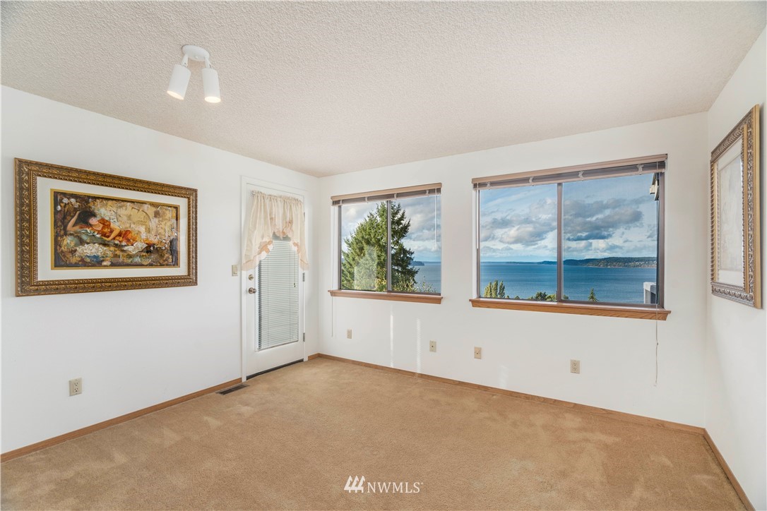 2604 Madrona Point Lane Steilacoom, WA 98388 - Photo 11 of 25 an empty room with windows