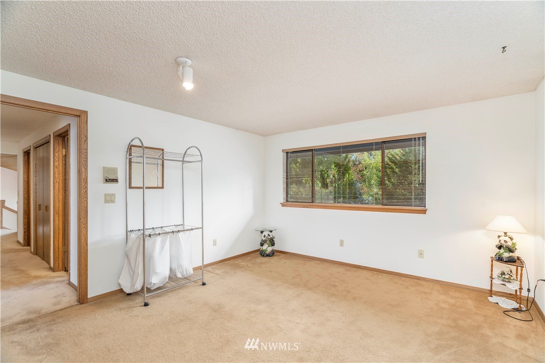 2604 Madrona Point Lane Steilacoom, WA 98388 - Photo 12 of 25 an empty room with a window