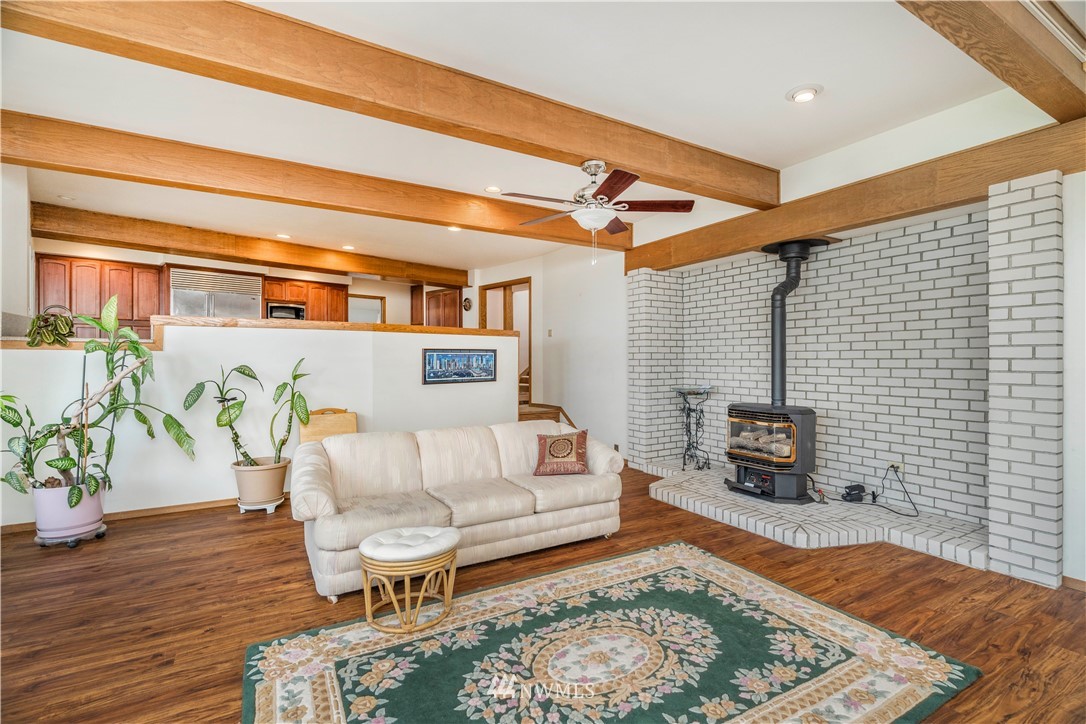 2604 Madrona Point Lane Steilacoom, WA 98388 - Photo 8 of 25 a living room with furniture and a rug