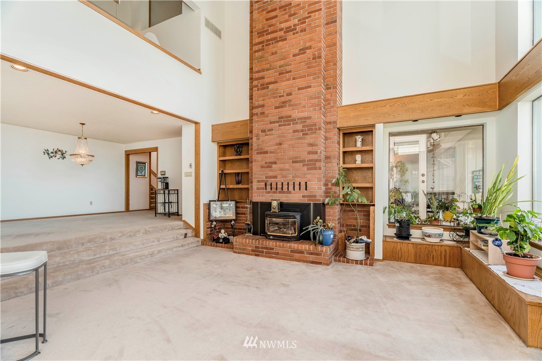 2604 Madrona Point Lane Steilacoom, WA 98388 - Photo 10 of 25 a view of a lobby with chair and tables