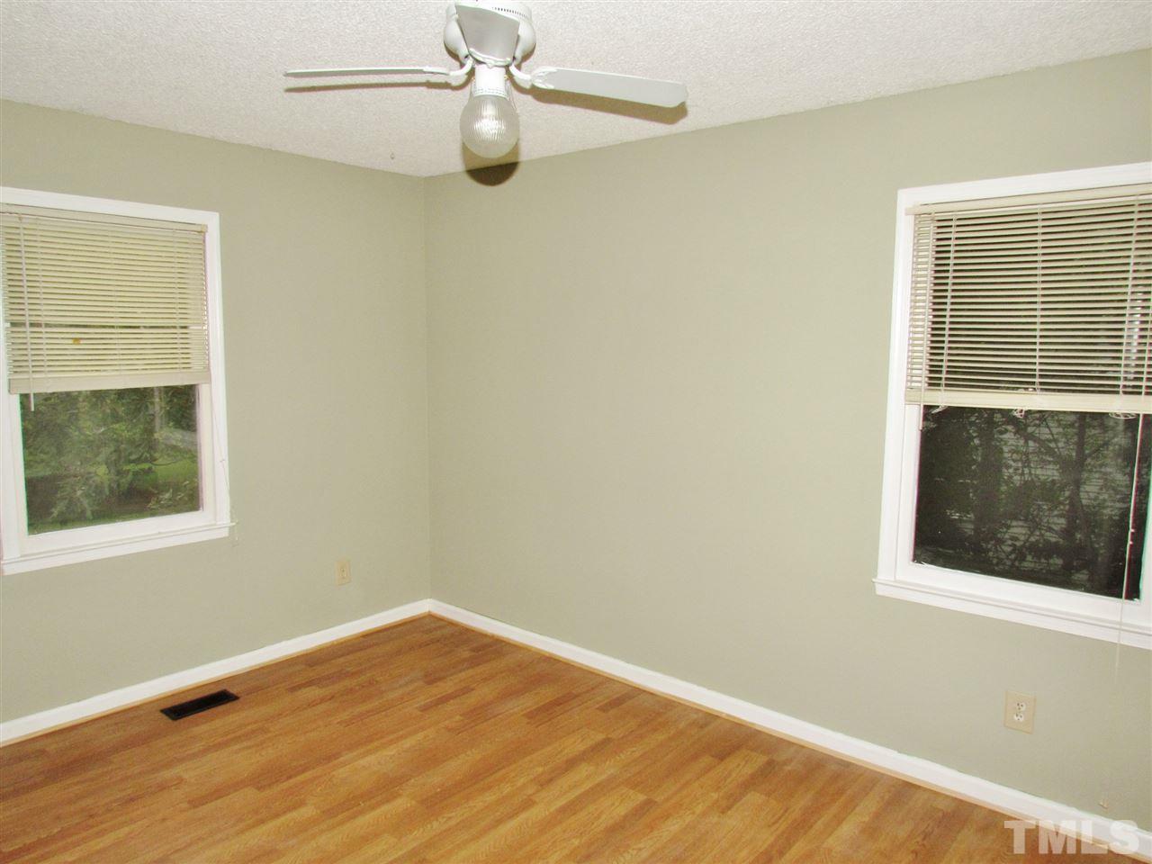 7813 Nugget Lane Raleigh, NC 27615 - Photo 11 of 25 an empty room with a window