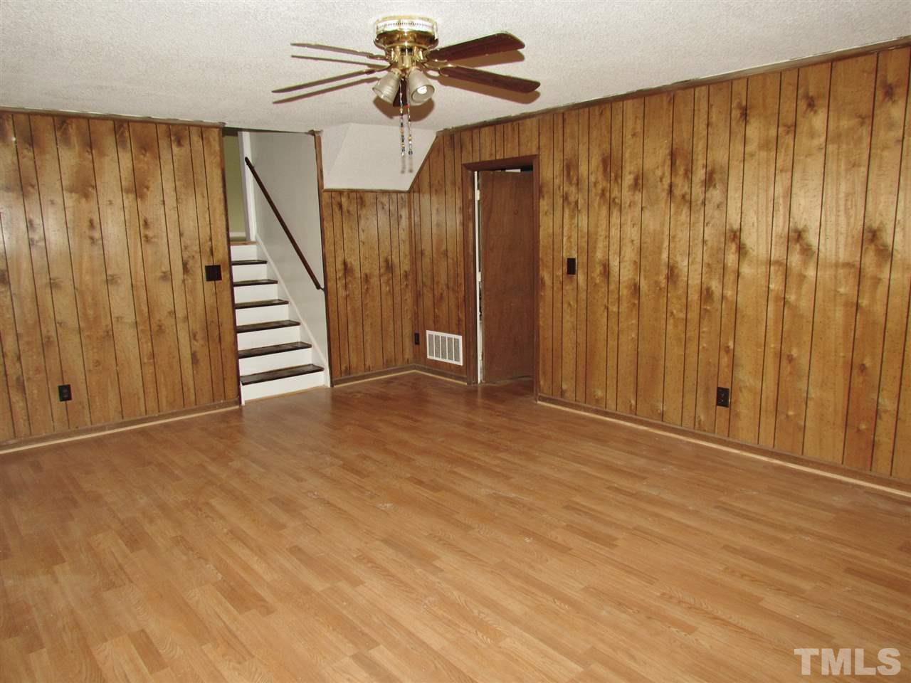 7813 Nugget Lane Raleigh, NC 27615 - Photo 17 of 25 wooden floor in an empty room