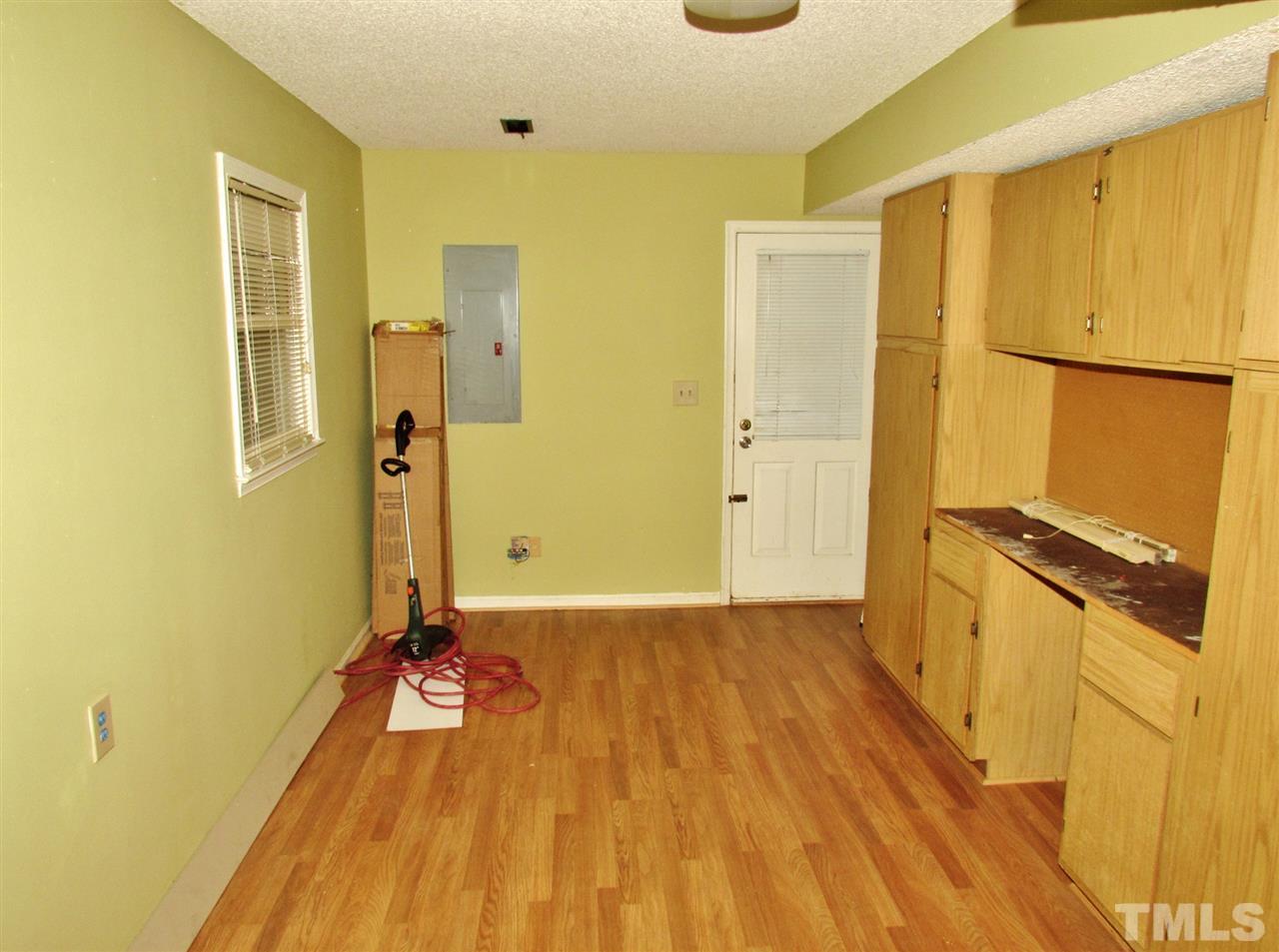 7813 Nugget Lane Raleigh, NC 27615 - Photo 19 of 25 a view of a room with wooden floor
