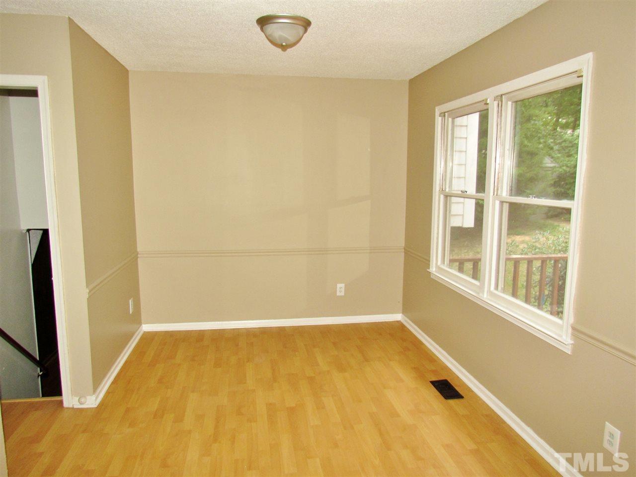 7813 Nugget Lane Raleigh, NC 27615 - Photo 6 of 25 a view of a room with a large window