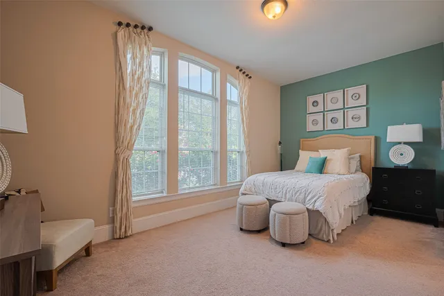a bathroom with a granite countertop sink mirror and shower