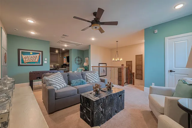 a bathroom with a toilet sink vanity and mirror