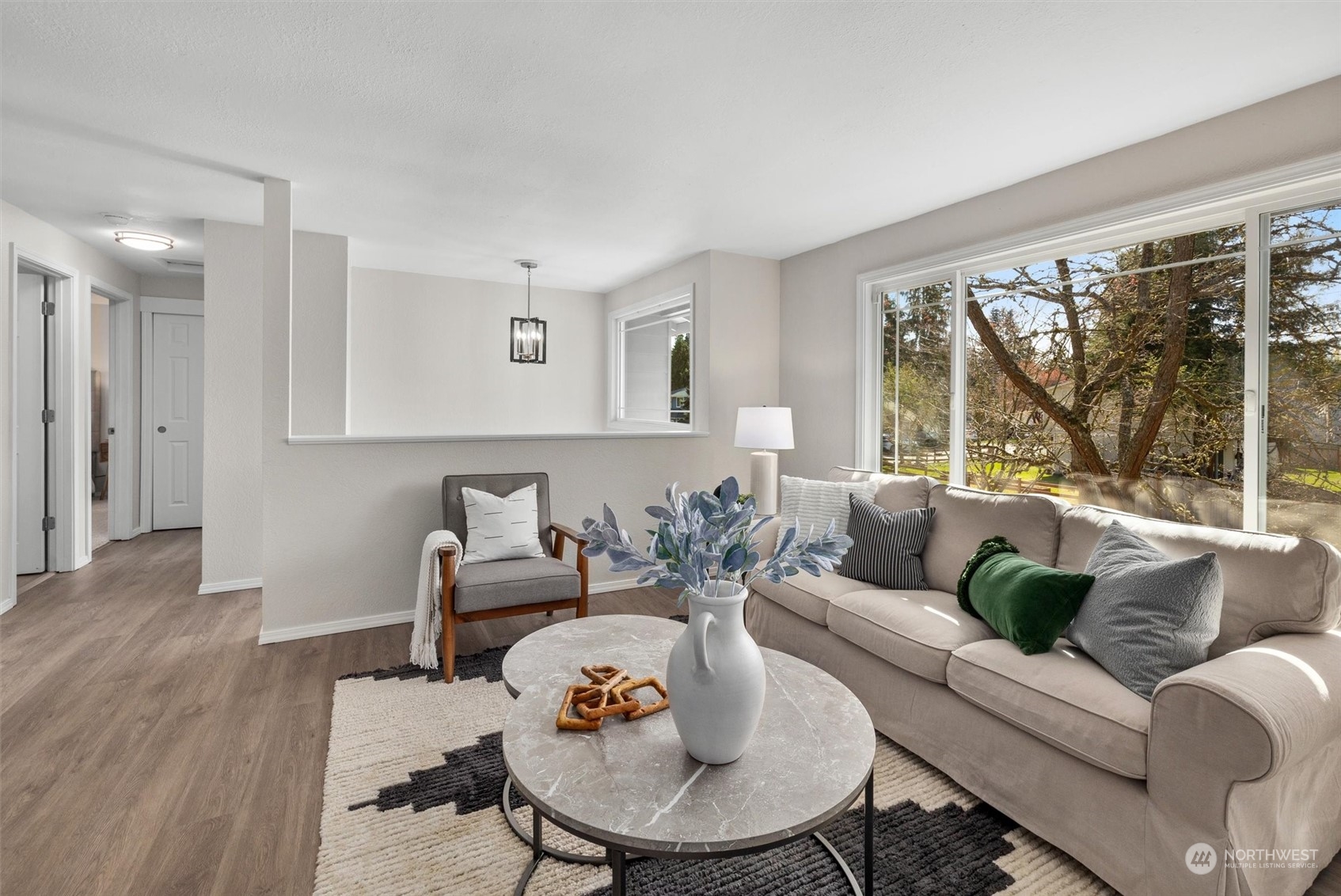 17021 30th Drive Southeast Bothell, WA 98012 - Photo 4 of 39 a living room with furniture and a large window