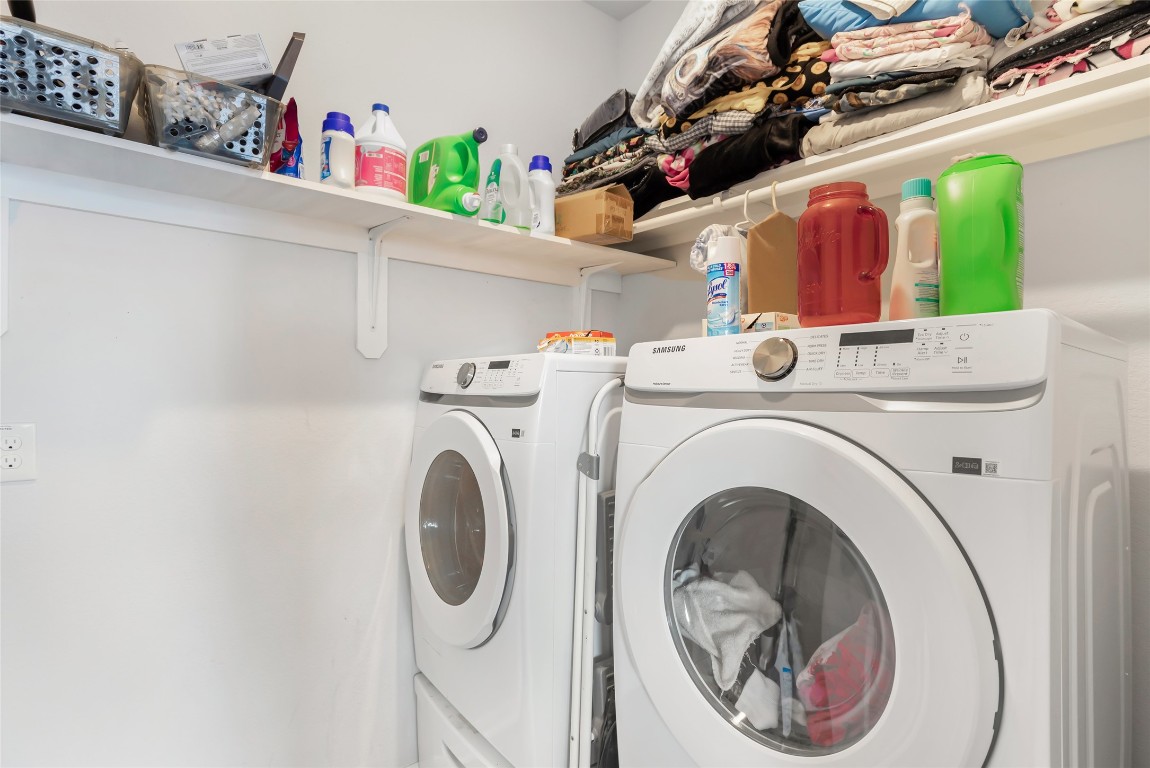 9910 Pine Forest Baytown, TX 77521 - Photo 16 of 26 a utility room with dryer and washer