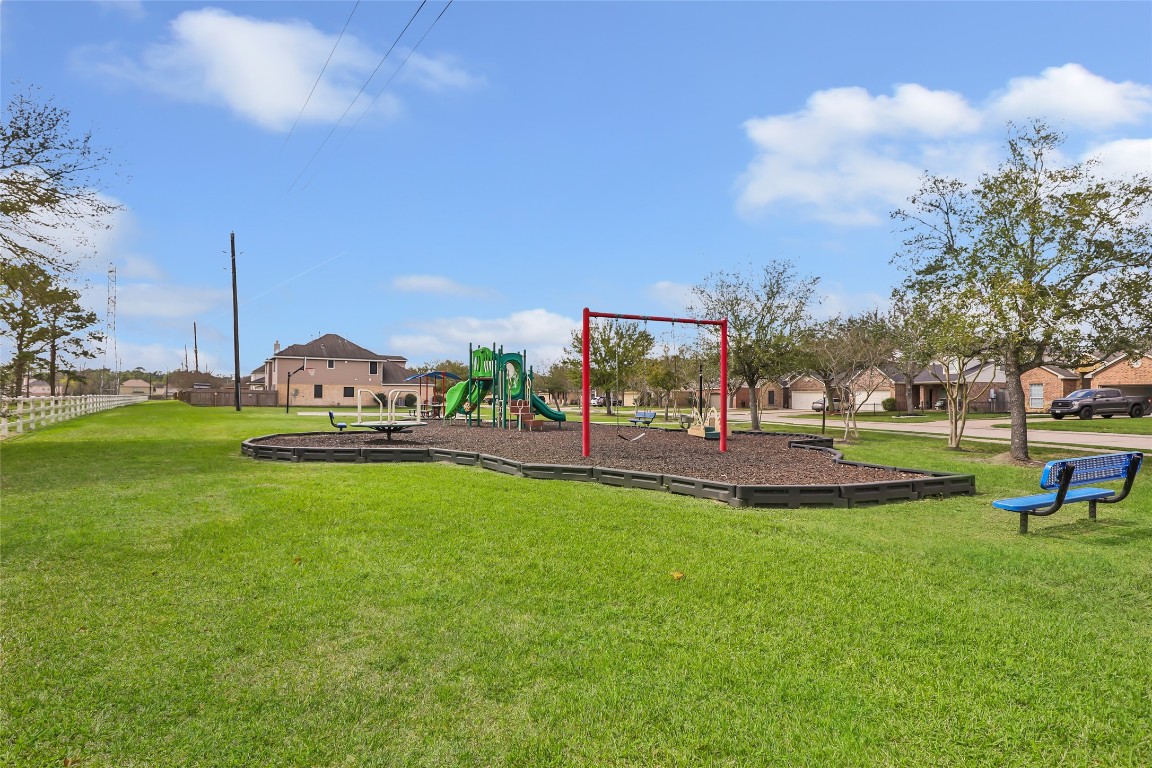 9910 Pine Forest Baytown, TX 77521 - Photo 25 of 26 a view of a park with houses