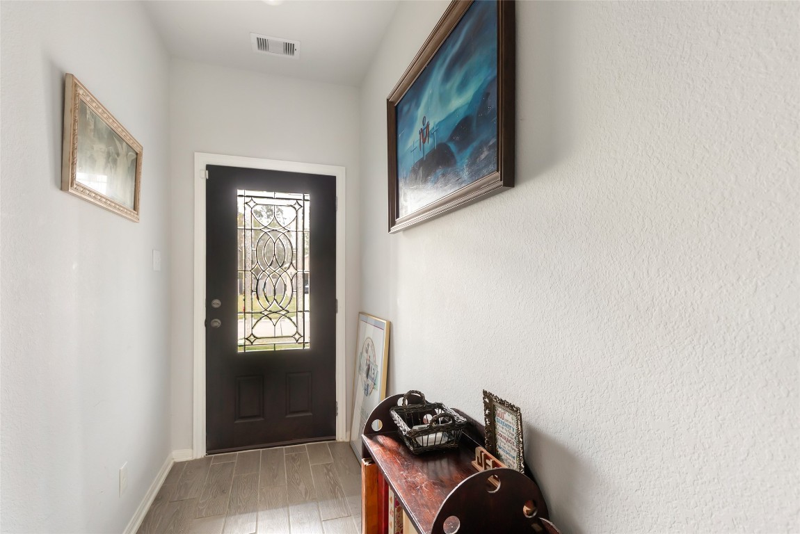 9910 Pine Forest Baytown, TX 77521 - Photo 5 of 26 a view of workspace with windows