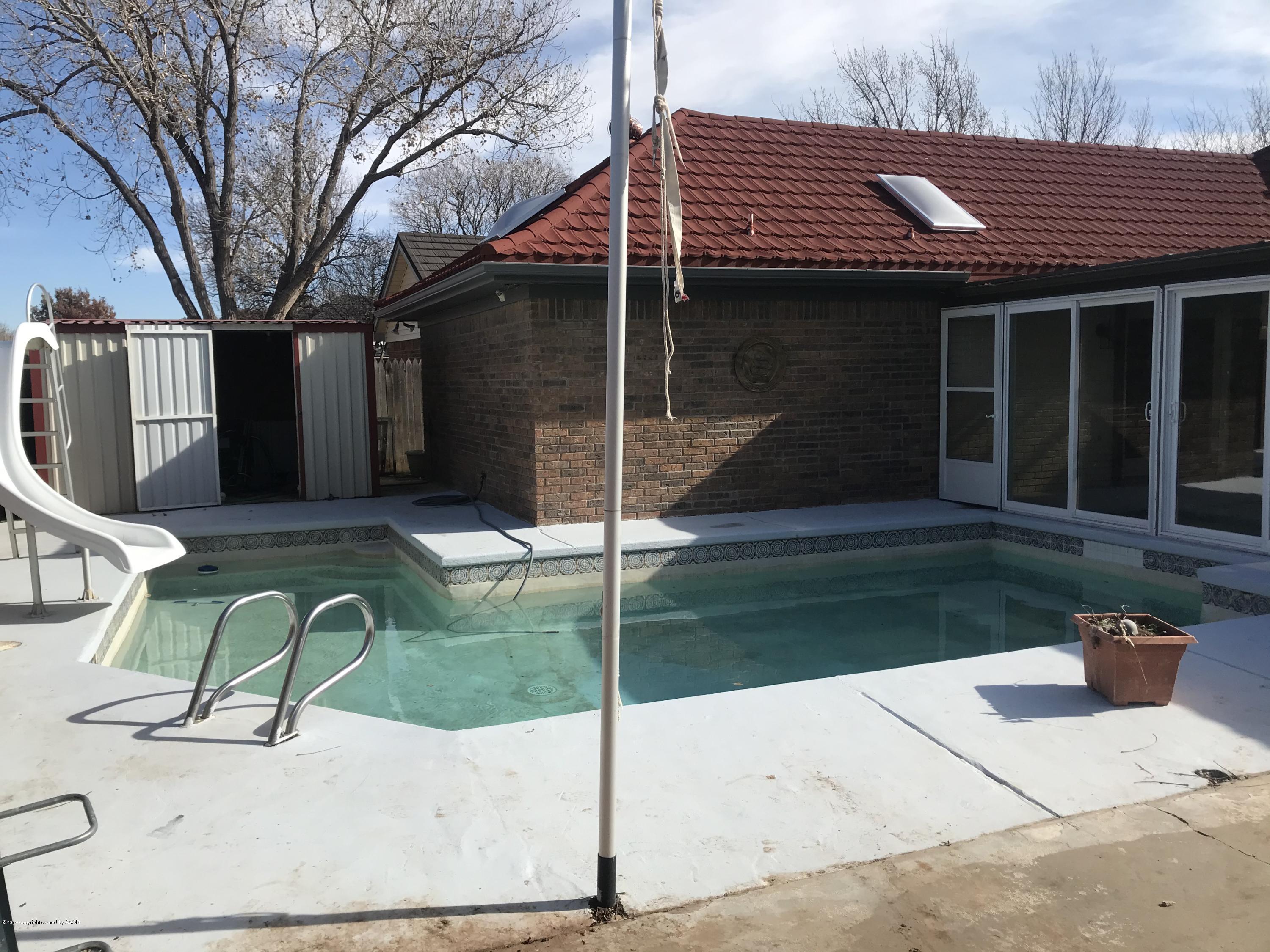 7516 Tripp Avenue Amarillo, TX 79121 - Photo 31 of 33 a house view with a garden space