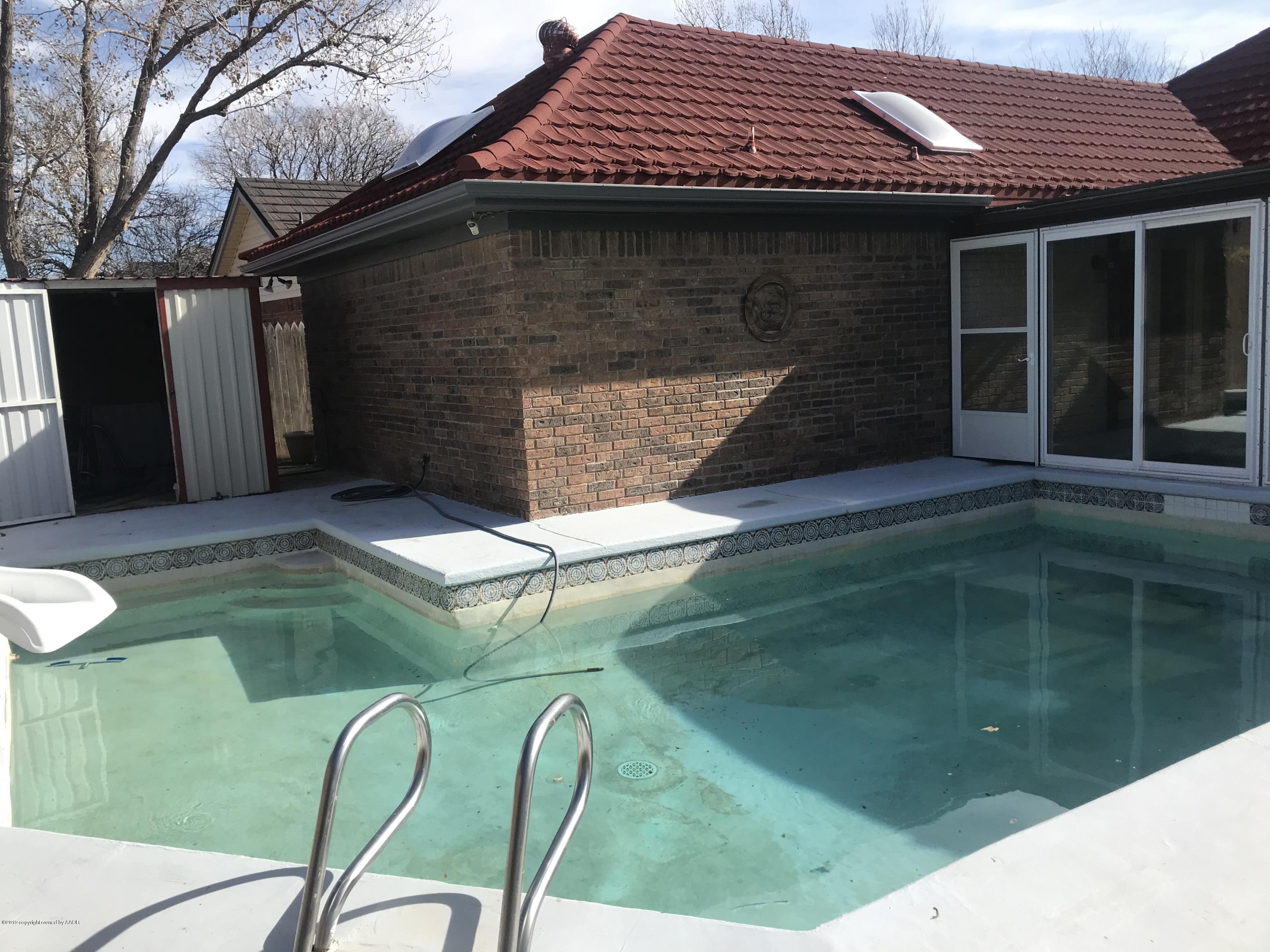 7516 Tripp Avenue Amarillo, TX 79121 - Photo 32 of 33 a backyard of a house