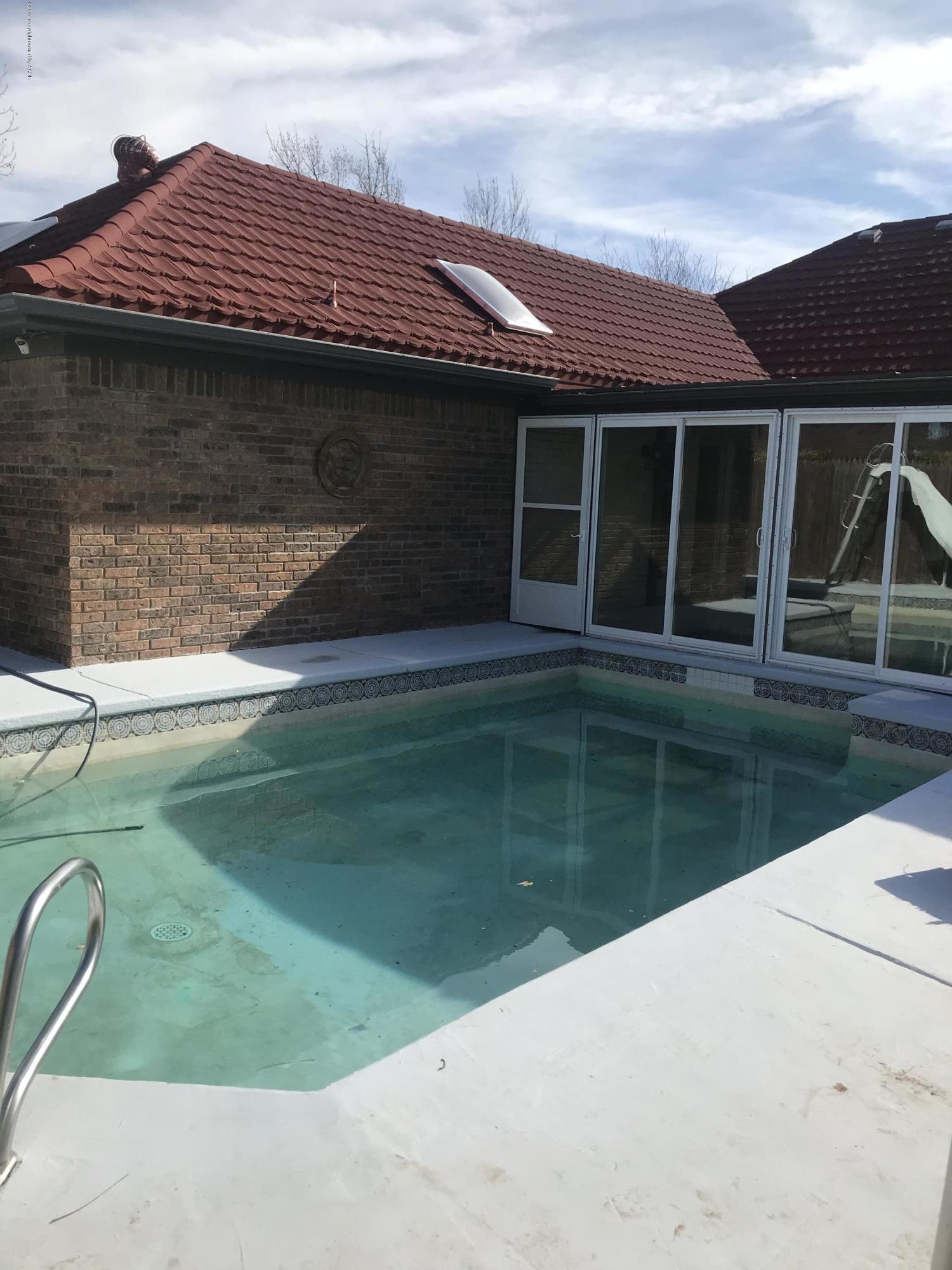 7516 Tripp Avenue Amarillo, TX 79121 - Photo 33 of 33 a view of a house with a yard
