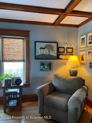 a living room with furniture and window