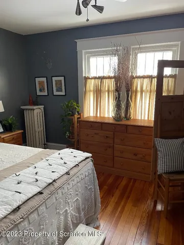 a bathroom with a sink double vanity and window