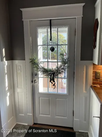 a backyard of a house with seating space