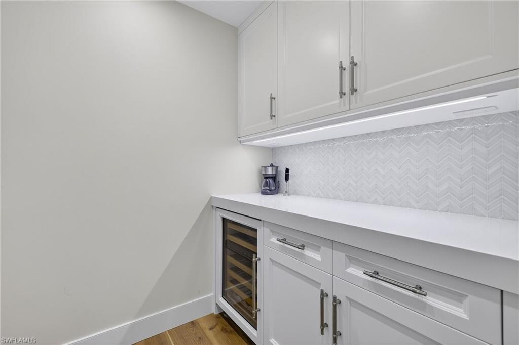 13915 Old Coast Road, Unit 1503 Naples, FL 34110 - Photo 13 of 49 a view of storage area and utility room