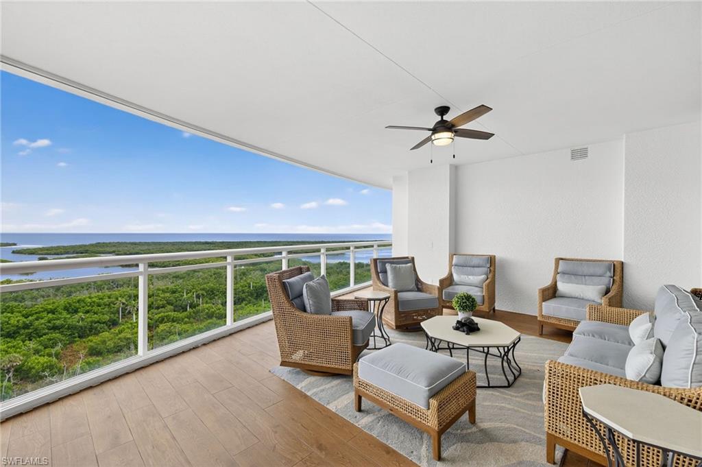 13915 Old Coast Road, Unit 1503 Naples, FL 34110 - Photo 30 of 49 a living room with furniture